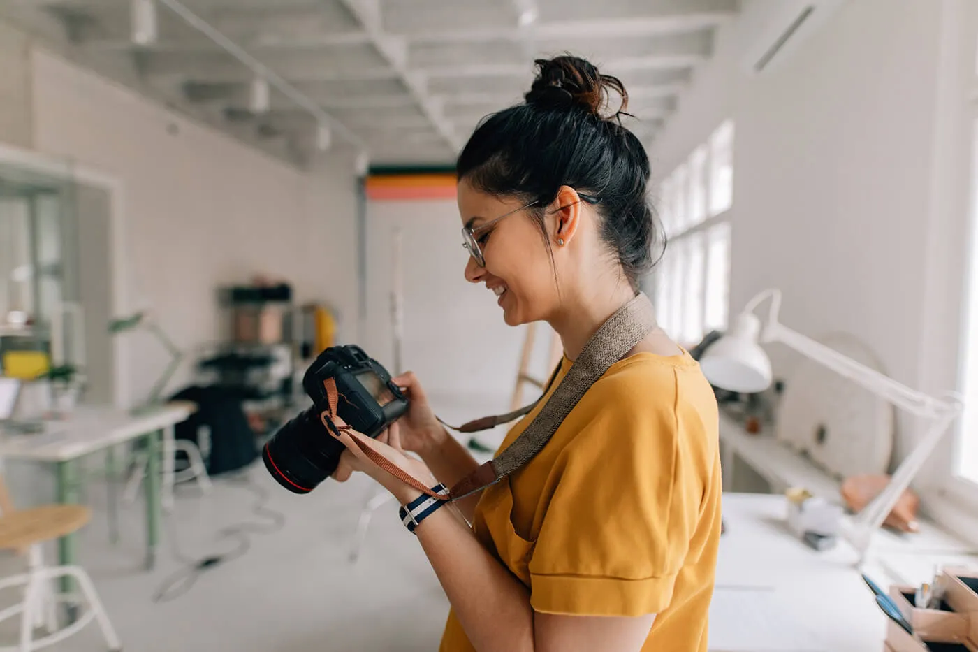Female photographer working in a studio