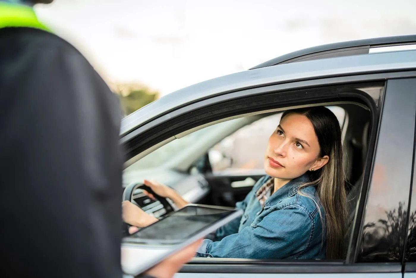 Young woman stopped by the traffic police