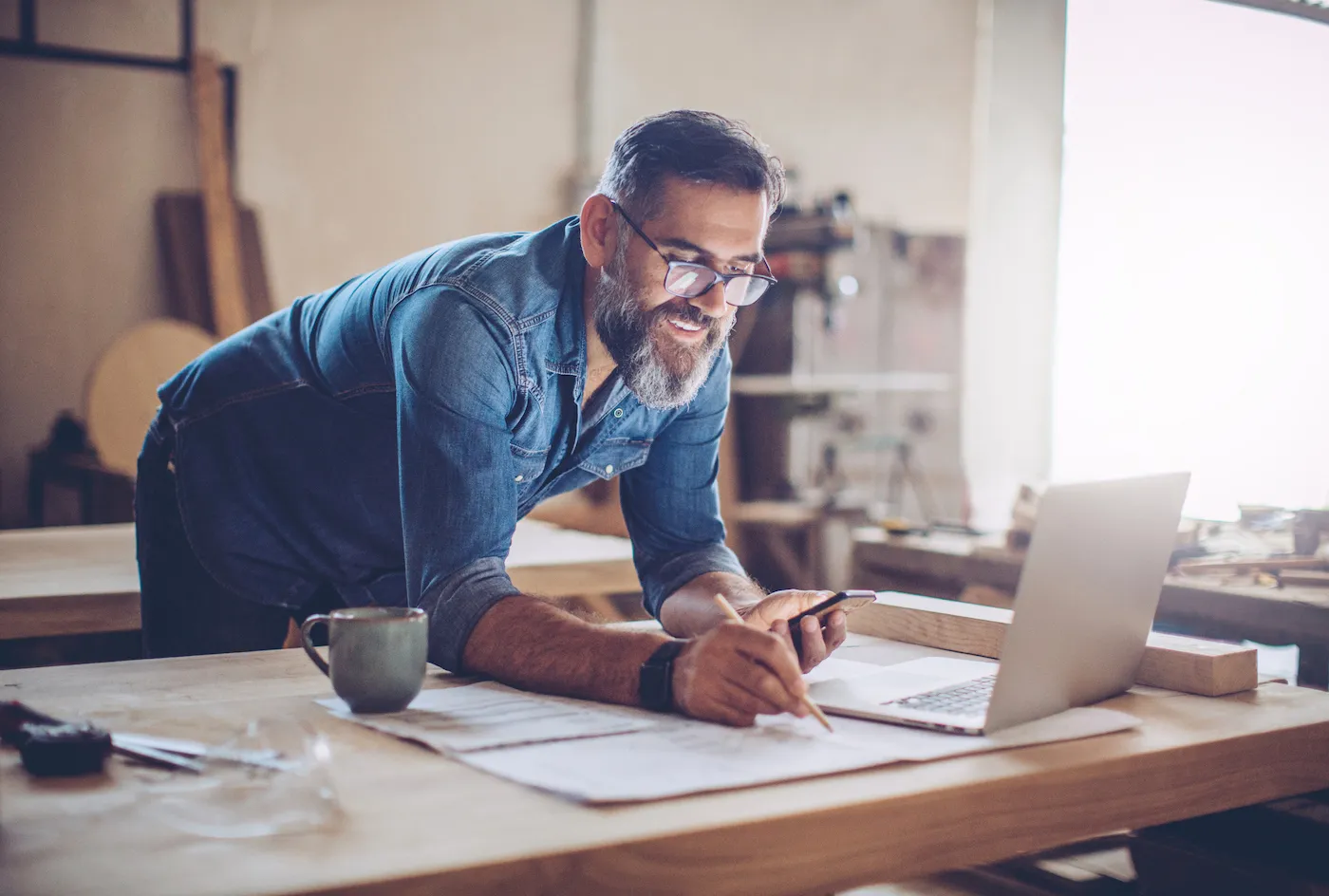 Senior man planning retirement under this year's new retirement savings rules
