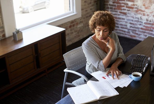A woman creates a plan for how to invest $50,000.