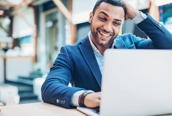 A man researches how to invest $50,000.