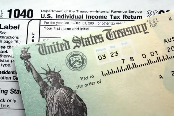 A tax form and a tax return check.