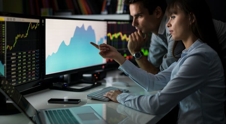 A couple reviewing their investments.