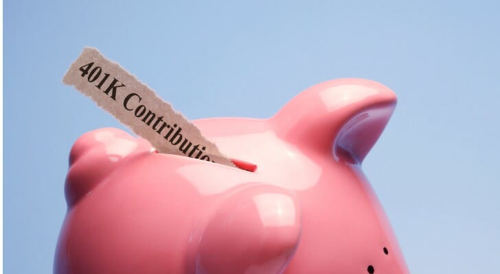 A piggy bank with a slip reading "401(k) contribution.)