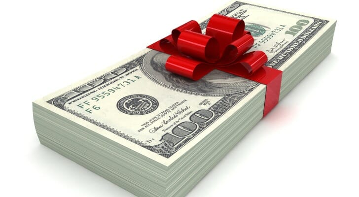 A stack of cash tied with a bow.