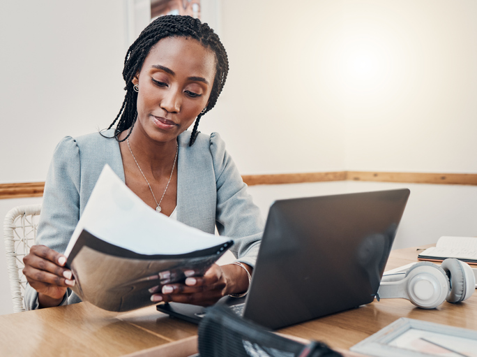 A woman researching venture capital investing opportunities.