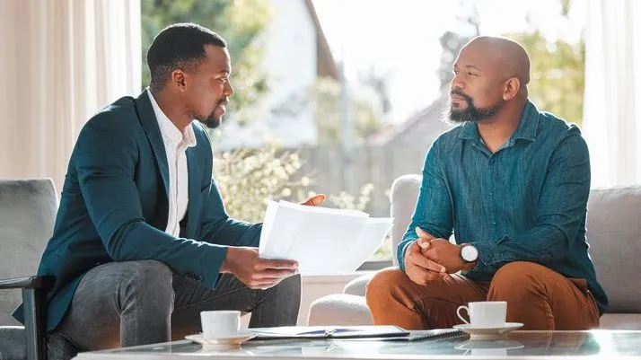 A financial advisor meets with a potential client to discuss his needs and where the advisor may be able to help.