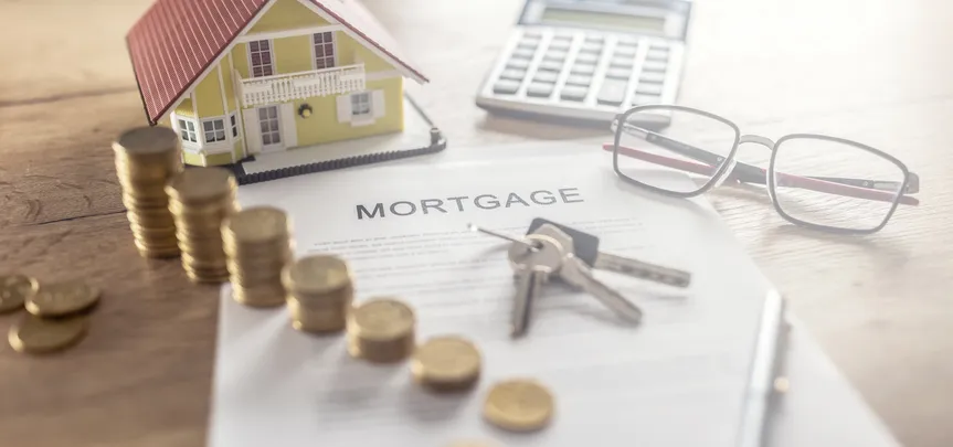 Paying extra on your mortgage can shorten your loan term, but it won’t lower your monthly payment unless you refinance.